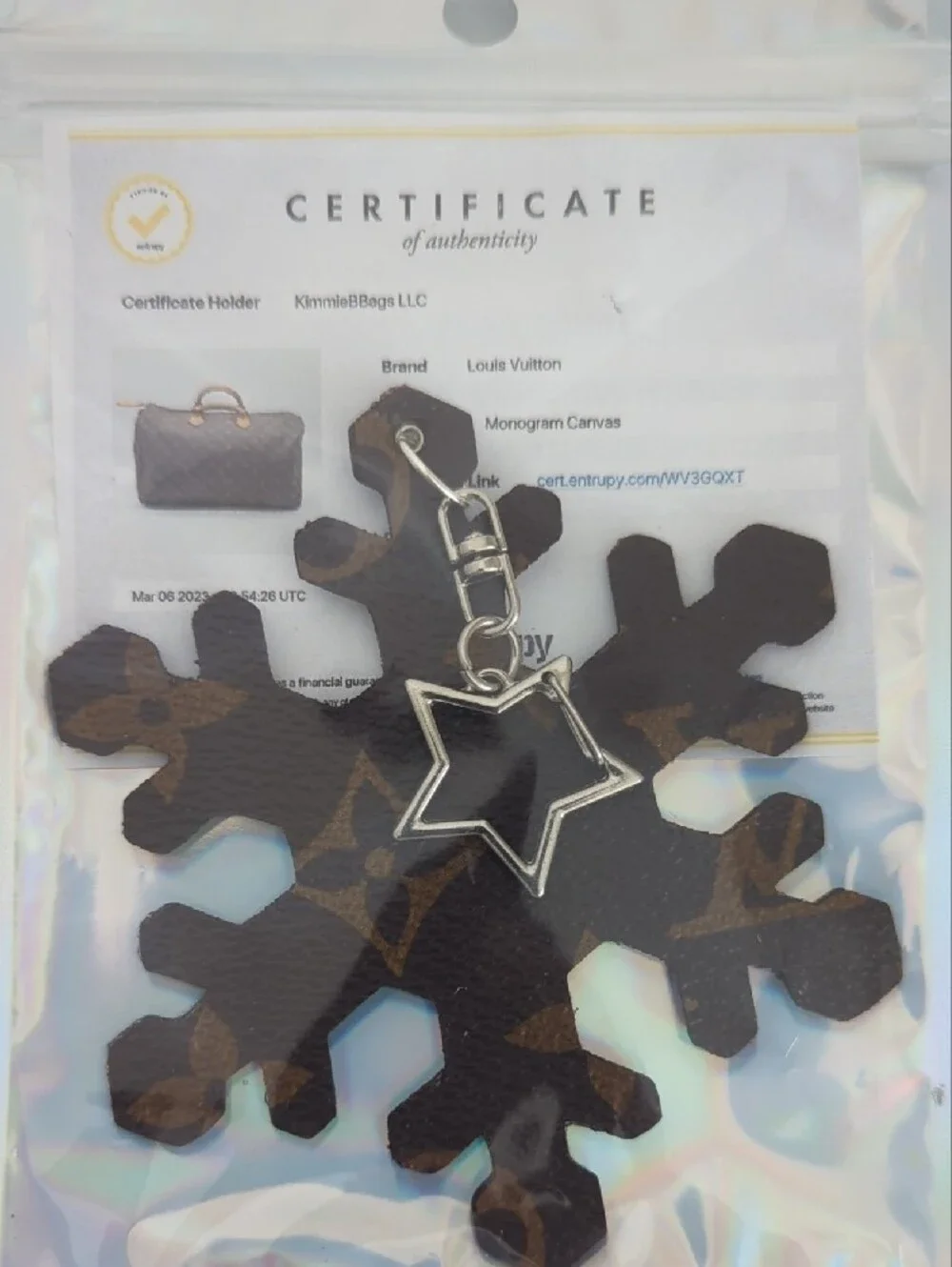 Louis Vuitton Brown Monogram Snowflake Key Charm with Silver Star Clasp COA Incl